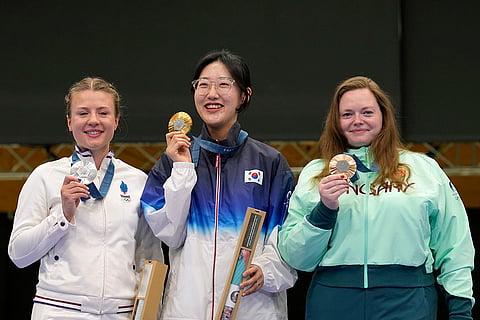 Women's 25m pistol: Gold medalist South Korea's Yang Jiin, center, silver medalist France's Camille Jedrezejewski, left, and bronze medalist Hungary's Veronika Major
